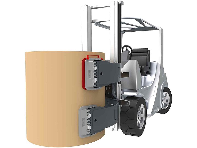 A silver forklift truck is equipped with a bale clamp holding a bale