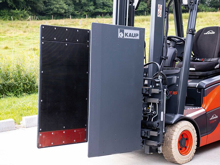 Forklift truck without driver with the Smart Load Control attachment on an outdoor site