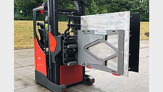 Forklift truck on an outdoor site with Smart Load Control attachment fitted
