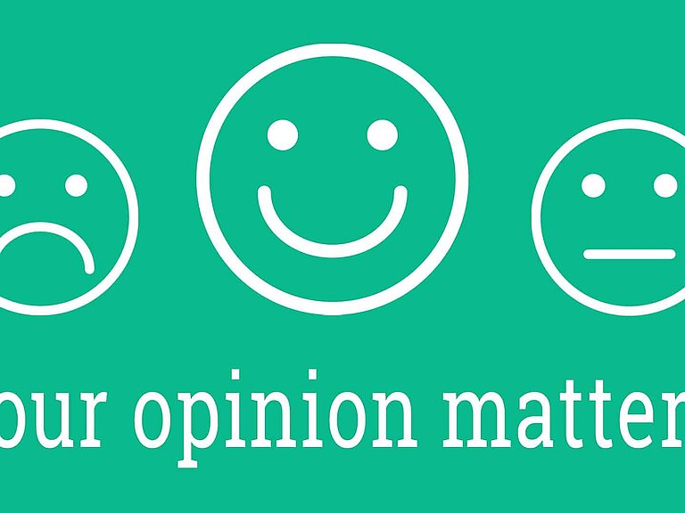 Three smileys, smiling, sad and neutral looking, with the inscription "Your opinion matters"